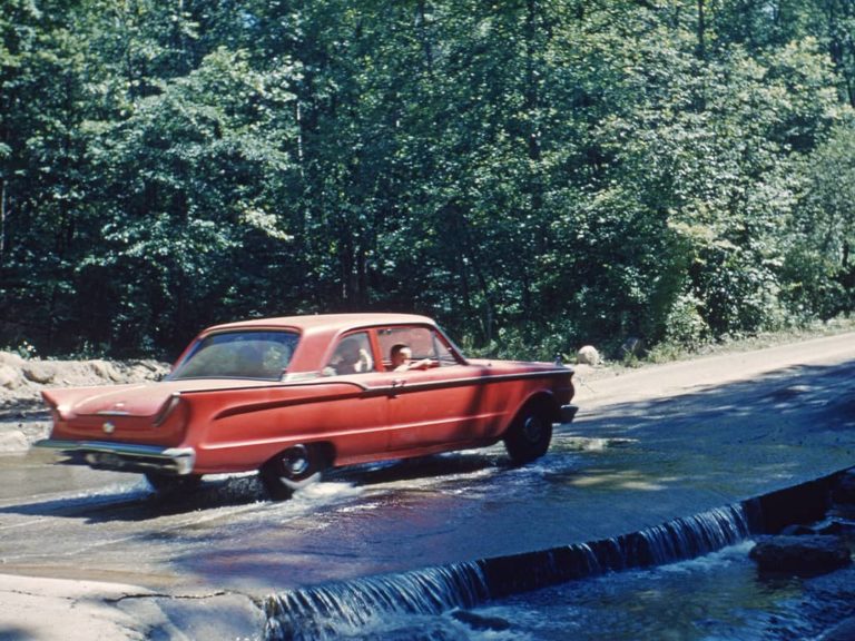A vehicle crosses the ford on Sand Run Parkway, 1963