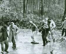 Hikers cross a stream during the spree, 1965