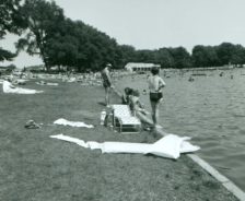 Sunbathers enjoy Munroe Falls swim lake, 1979